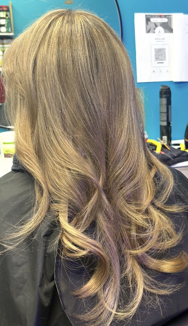 Ash blonde blowout with bouncy ends