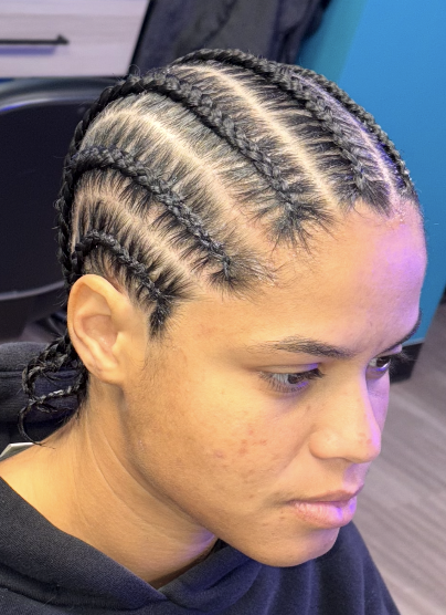 Neat cornrow braids close-up