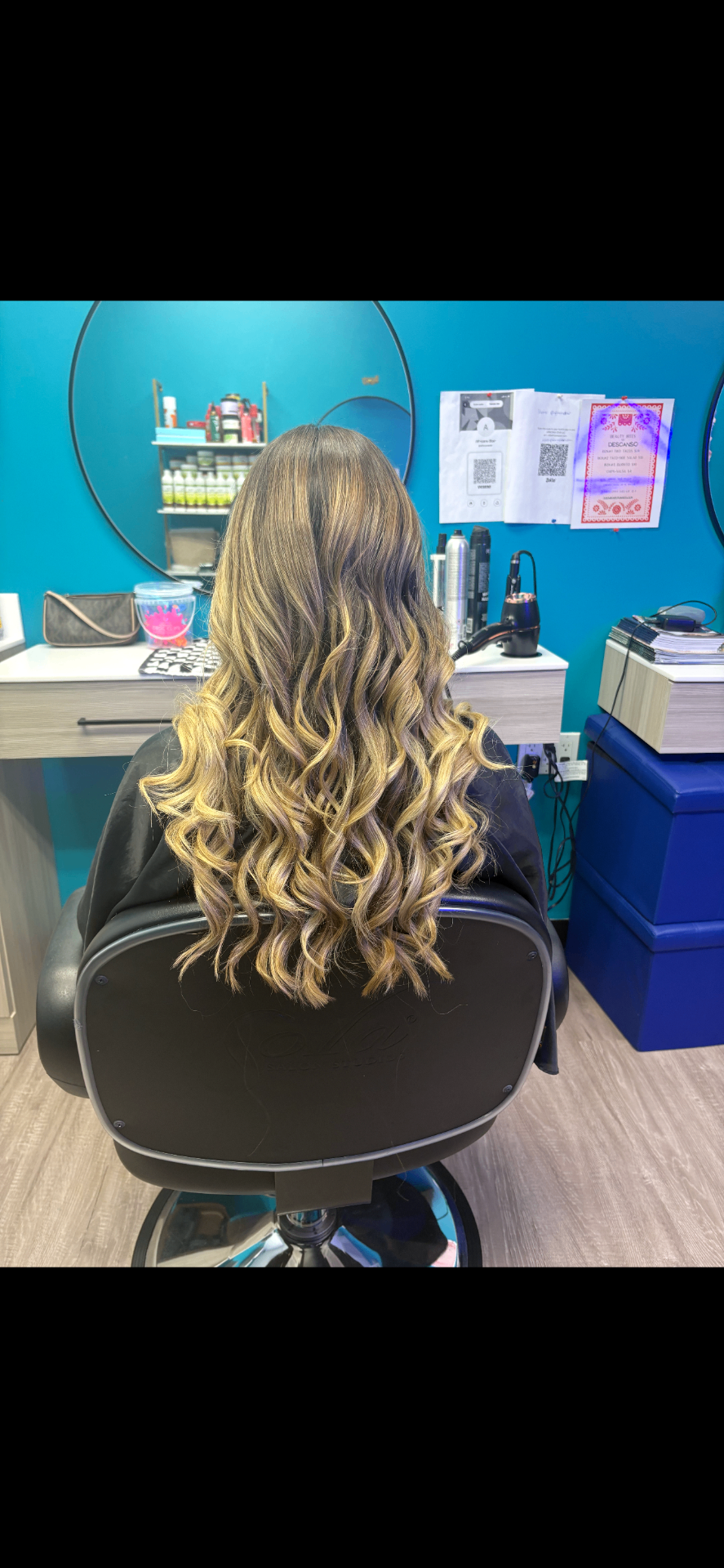 Long balayage with bouncy curls